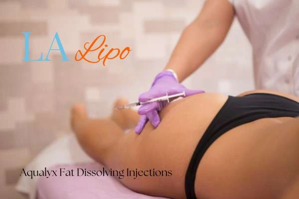 Woman having fat dissolving injections Brentford on thighs