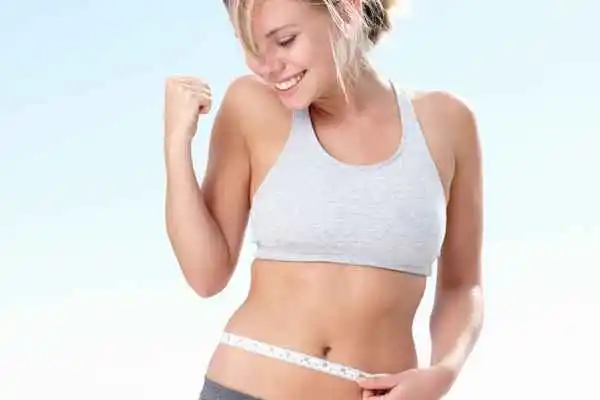 woman happy after fat reduction treatment Brentford