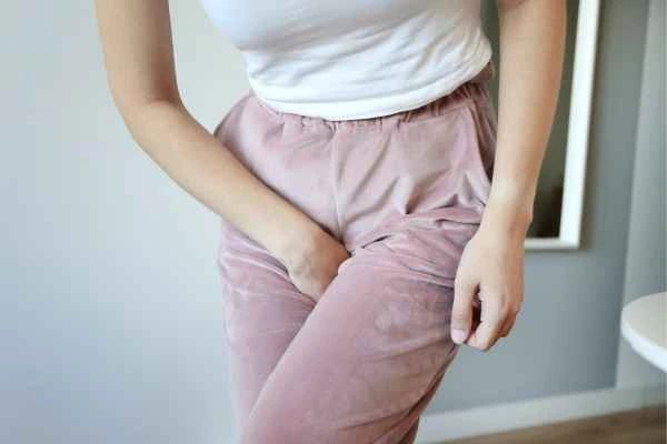 older woman running to the toilet because of urinary incontinence Brentford